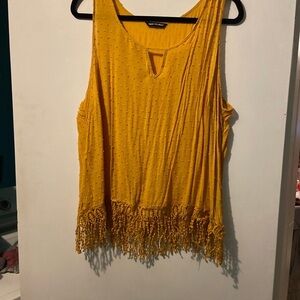 Cute gold fringe tank top.